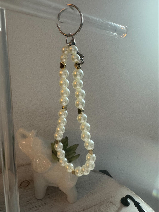 Faux Pearl keychain with gold hearts.